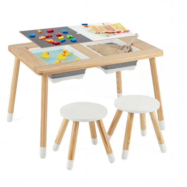 Wooden sensory activity table with two stools, water, sand, rubber ducks, and building blocks