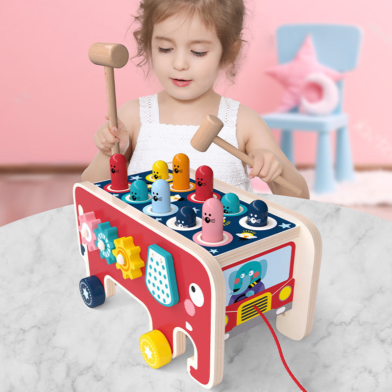 Montessori wooden pounding toy for toddlers designed to support sensory play, fine motor skills, coordination, focus, and early childhood development