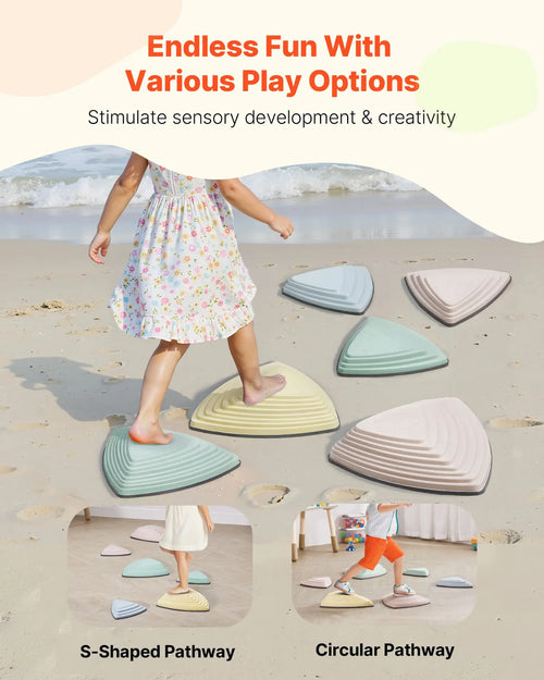 Child playing on colorful S-shaped and circular pathways on a beach