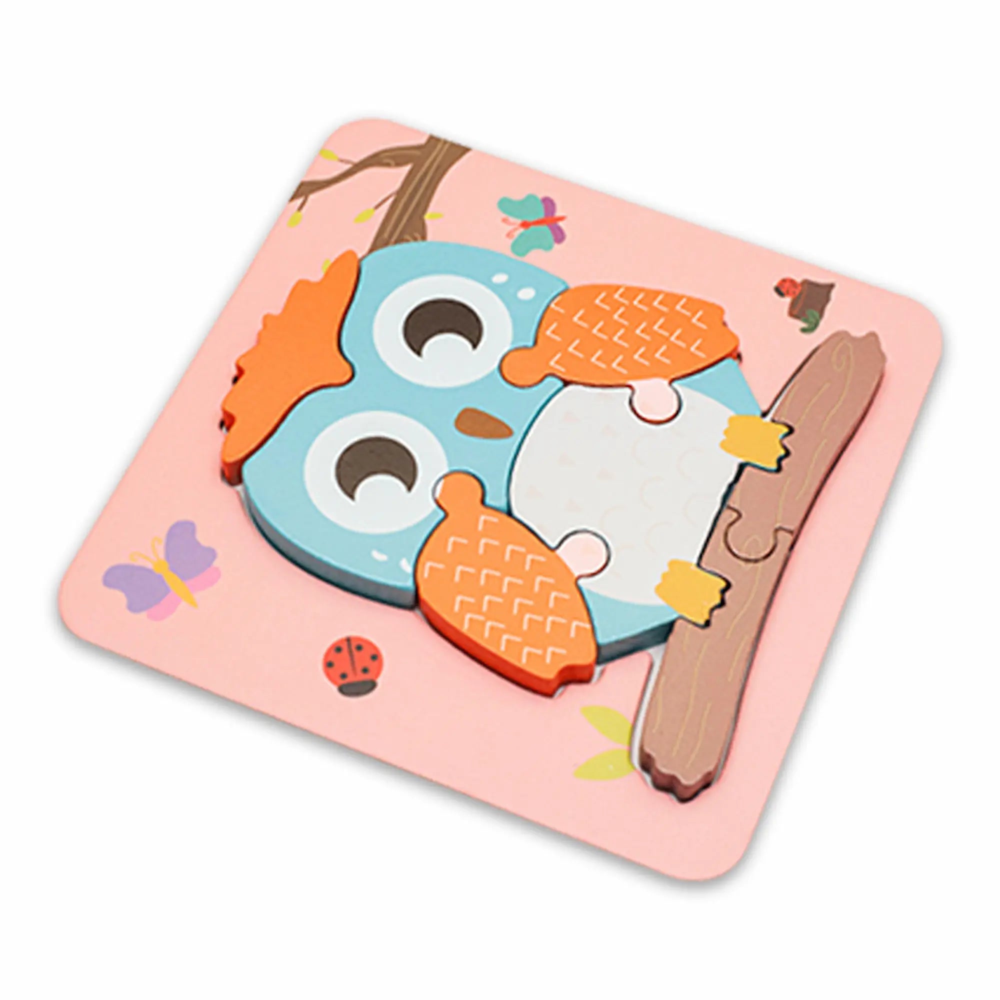 Children's owl puzzle on a pink