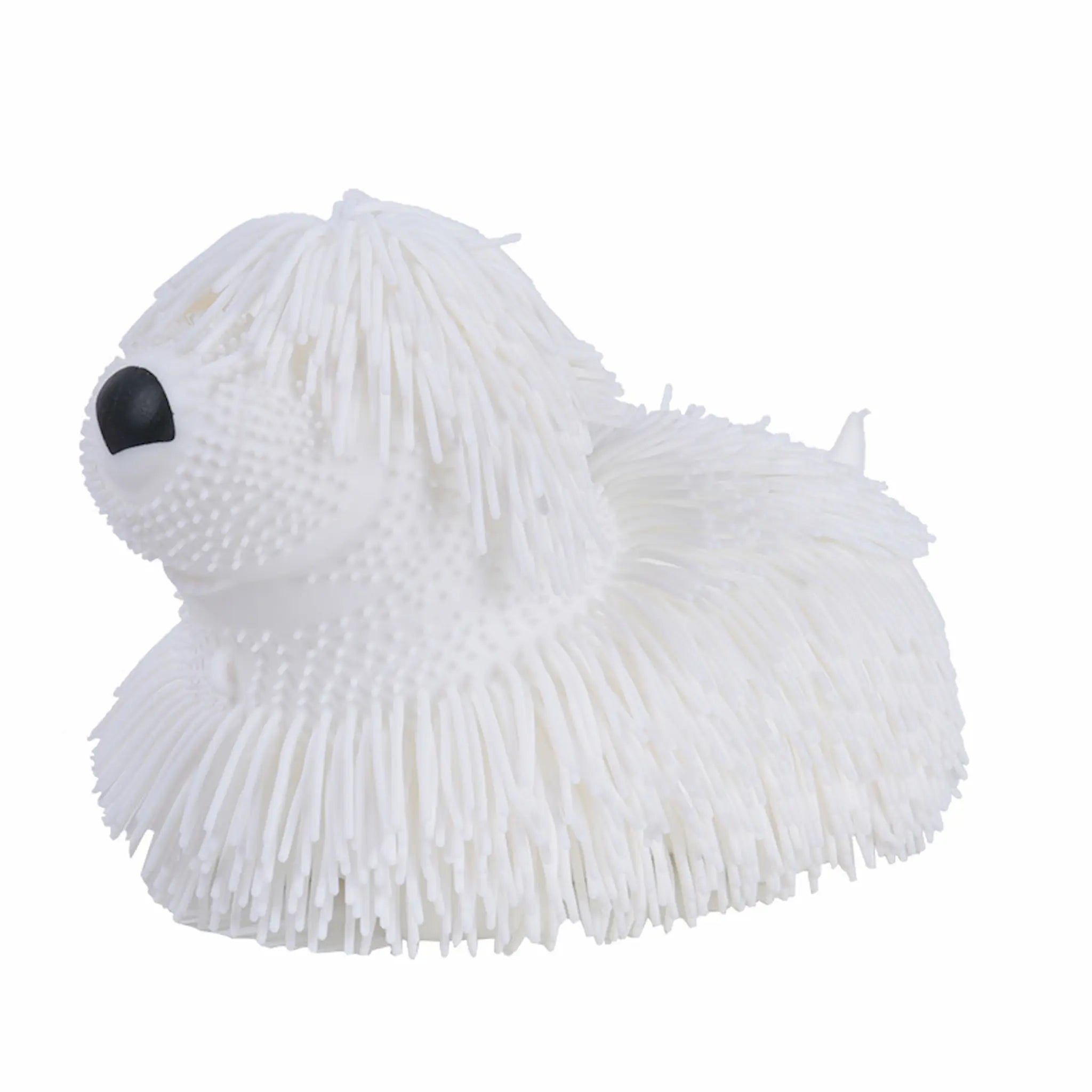 White fluffy dog-shaped toy on a white background
