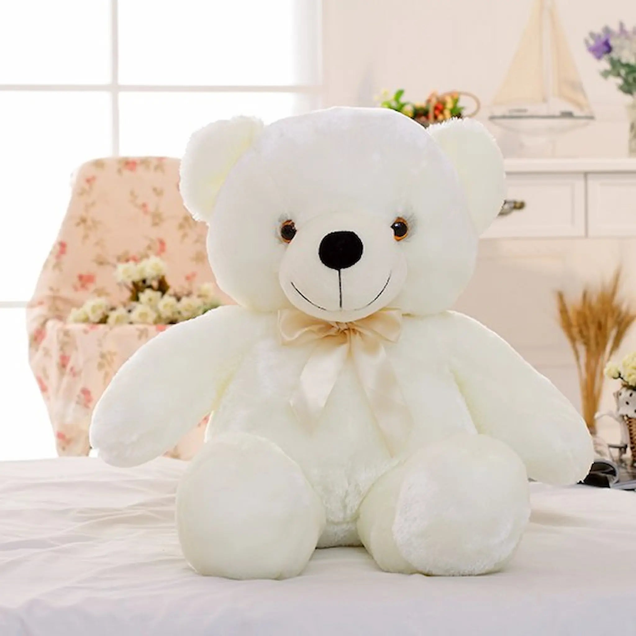 white teddy bear alone